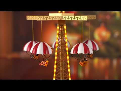 Load video: Mr. Christmas Animated & Musical World's Fair Parachute Ride Video Overview featuring moving parachutes with riders and festive Christmas music in the background.