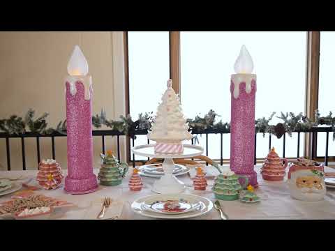 Load video: Video of Mr. Christmas 12" Nostalgic Ceramic Lit Candy Cane Tree with glowing pink, green, and white LED bulbs and candy cane topper