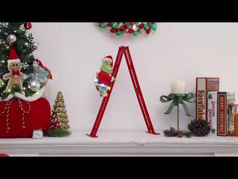 Load video: Mr. Christmas 17 in. Animated Ladder Climbing Grinch moving up and down a tabletop red ladder
