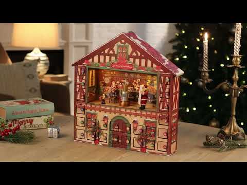 Load video: Video overview of the Mr. Christmas Animated Santa’s Workshop Advent Calendar showing door animations, music, and light-up scenes.