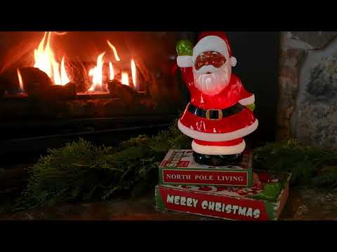 Load video: 12 in. Vintage Illuminated Mercury Glass Figurine - Santa