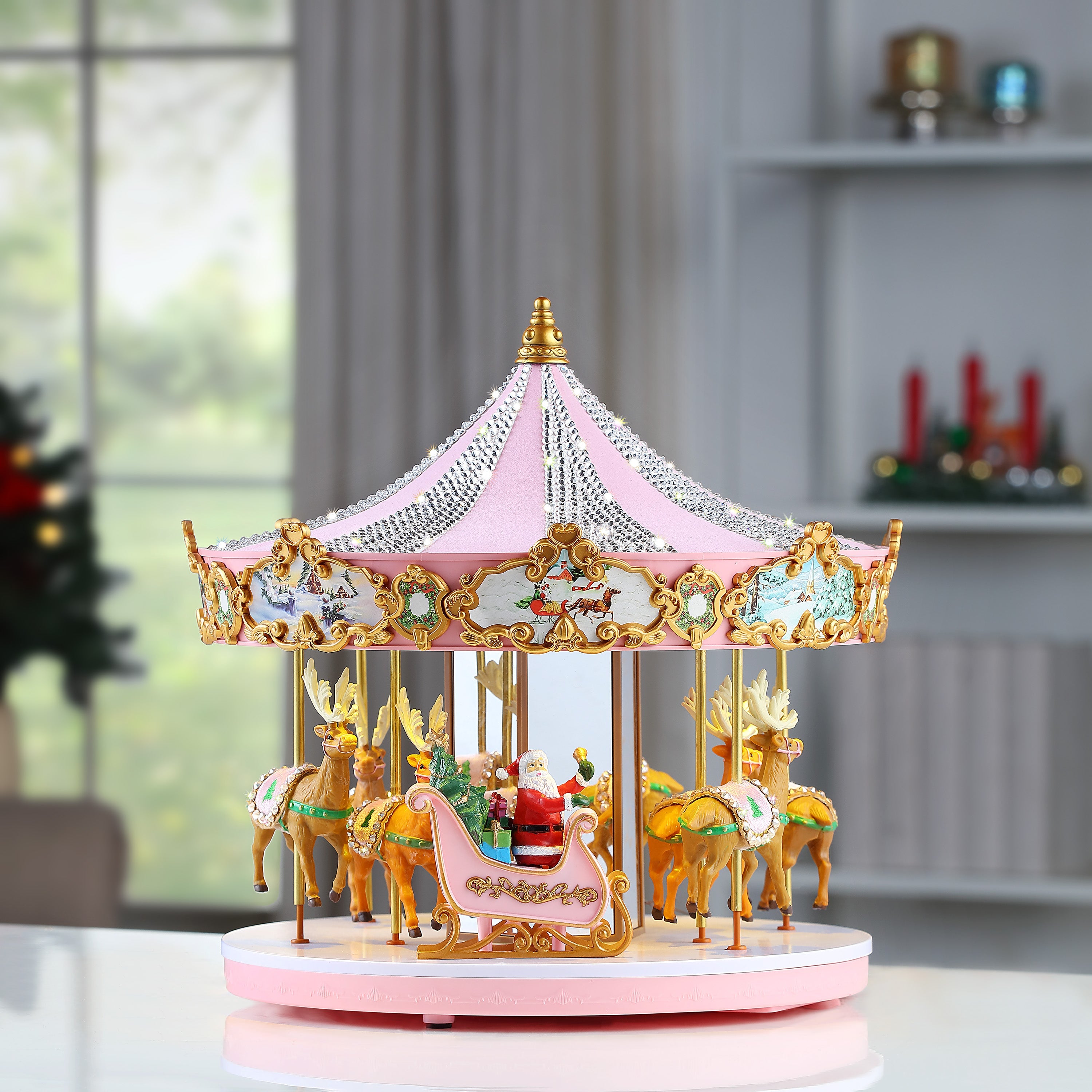 Mr. Christmas 12" Animated & Musical Pink Crystal Carousel displayed as elegant tabletop Christmas decoration