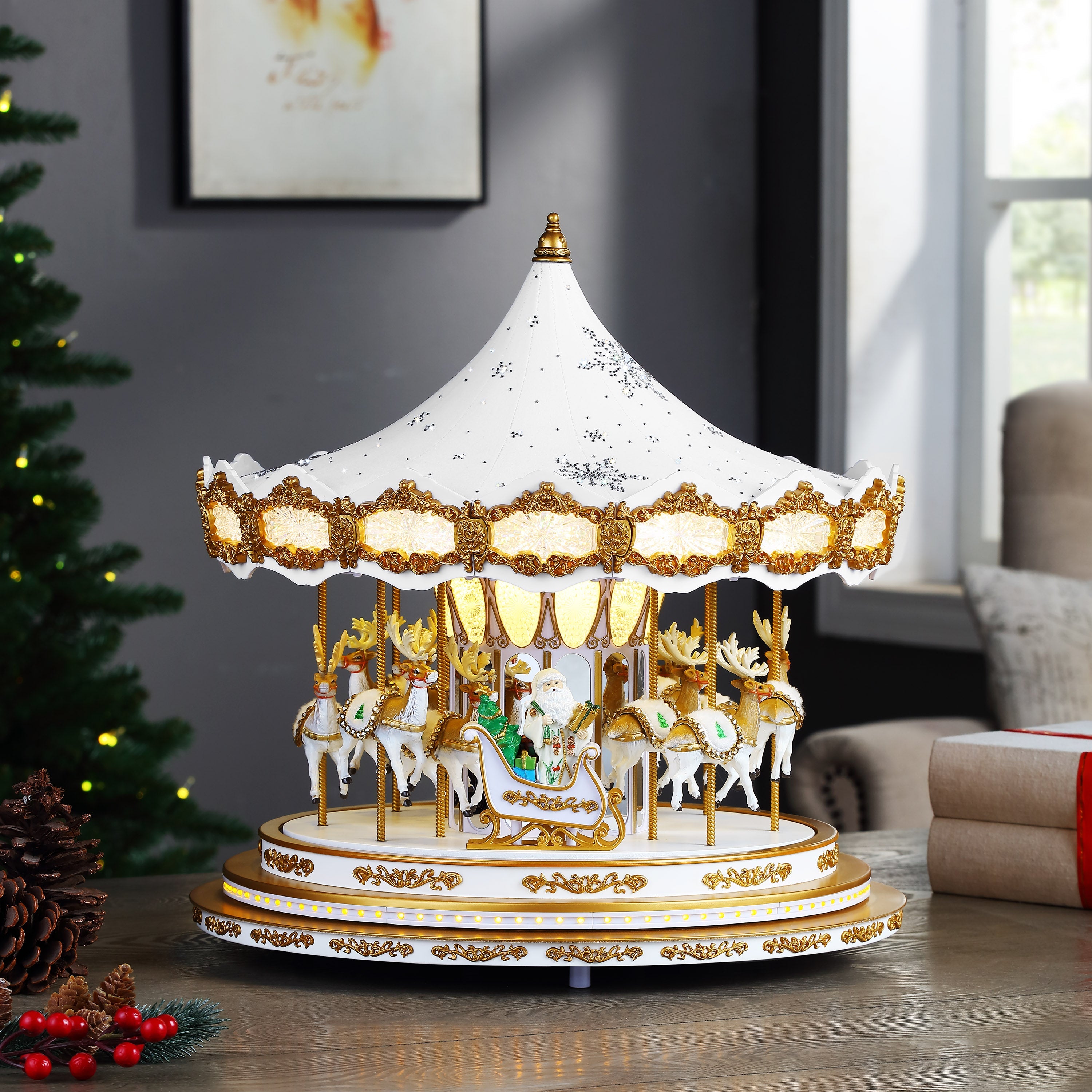 Mr. Christmas Animated & Musical White Snowflake Crystal Carousel displayed along with a festive holiday scene.