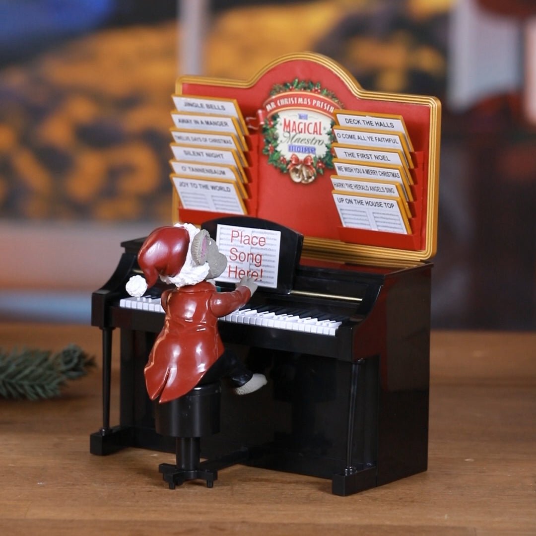 Alternate lifestyle image of Mr. Christmas Magical Maestro Mouse in a holiday setting.