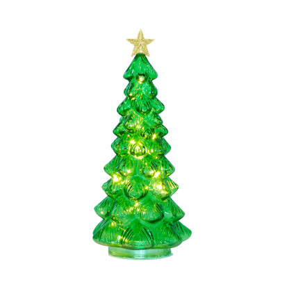 A small, translucent green Christmas tree light with warm yellow lights glowing inside and a glittery gold star on top, isolated on a white background.