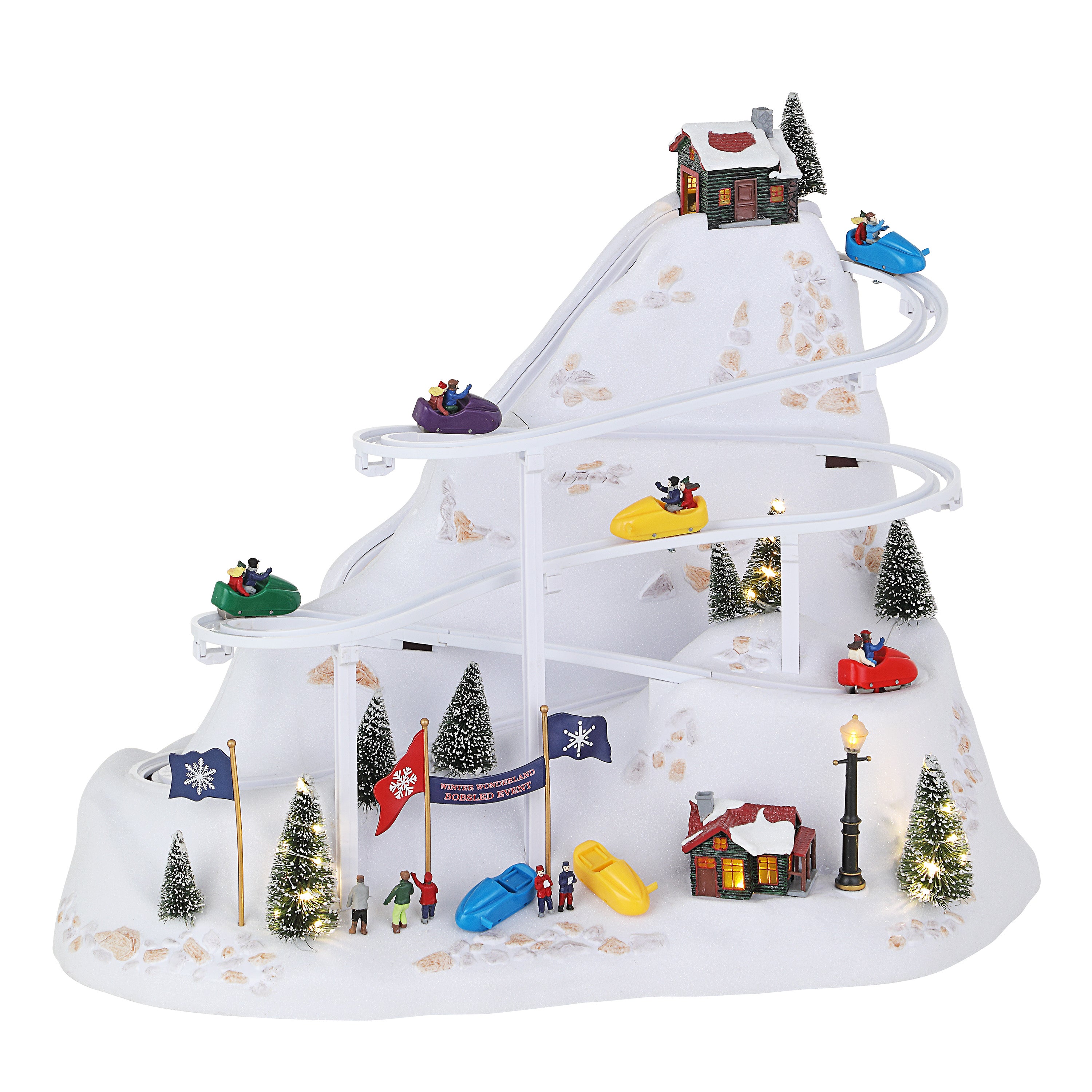 Model of a snowy mountain with a ski lift and miniature buildings on a white background
