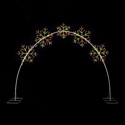 A white metal arch light fixture with five snowflake-shaped bulbs illuminated in warm white and orange-red tones, set against a solid black background.