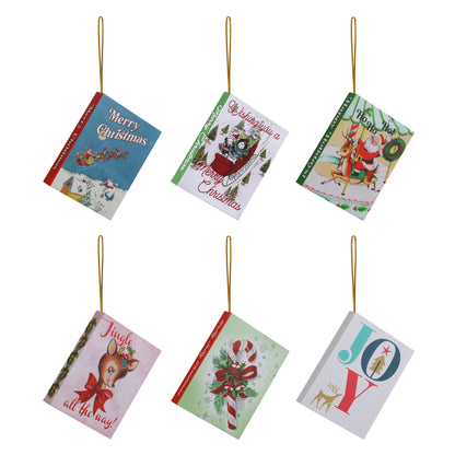 Set of Christmas-themed book ornaments on a white background