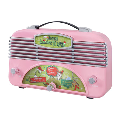Pink retro-style grinch portable radio toy with silver grille details, a black carrying handle, and colorful Dr. Seuss-themed front graphics including the 'Jungle Jammer Tuner' logo and character illustrations.