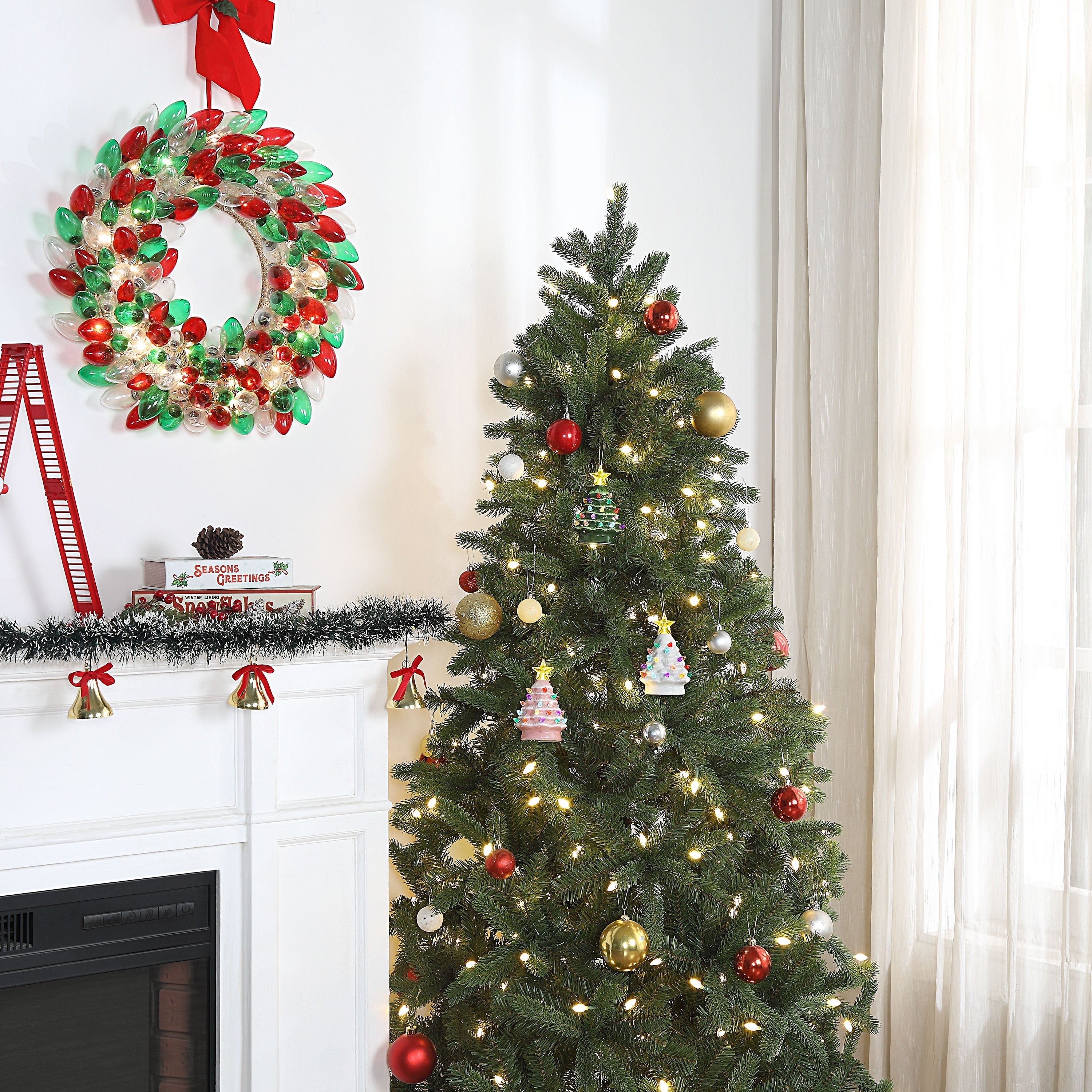 Decorated Christmas tree with lights and ornaments in a festive room.