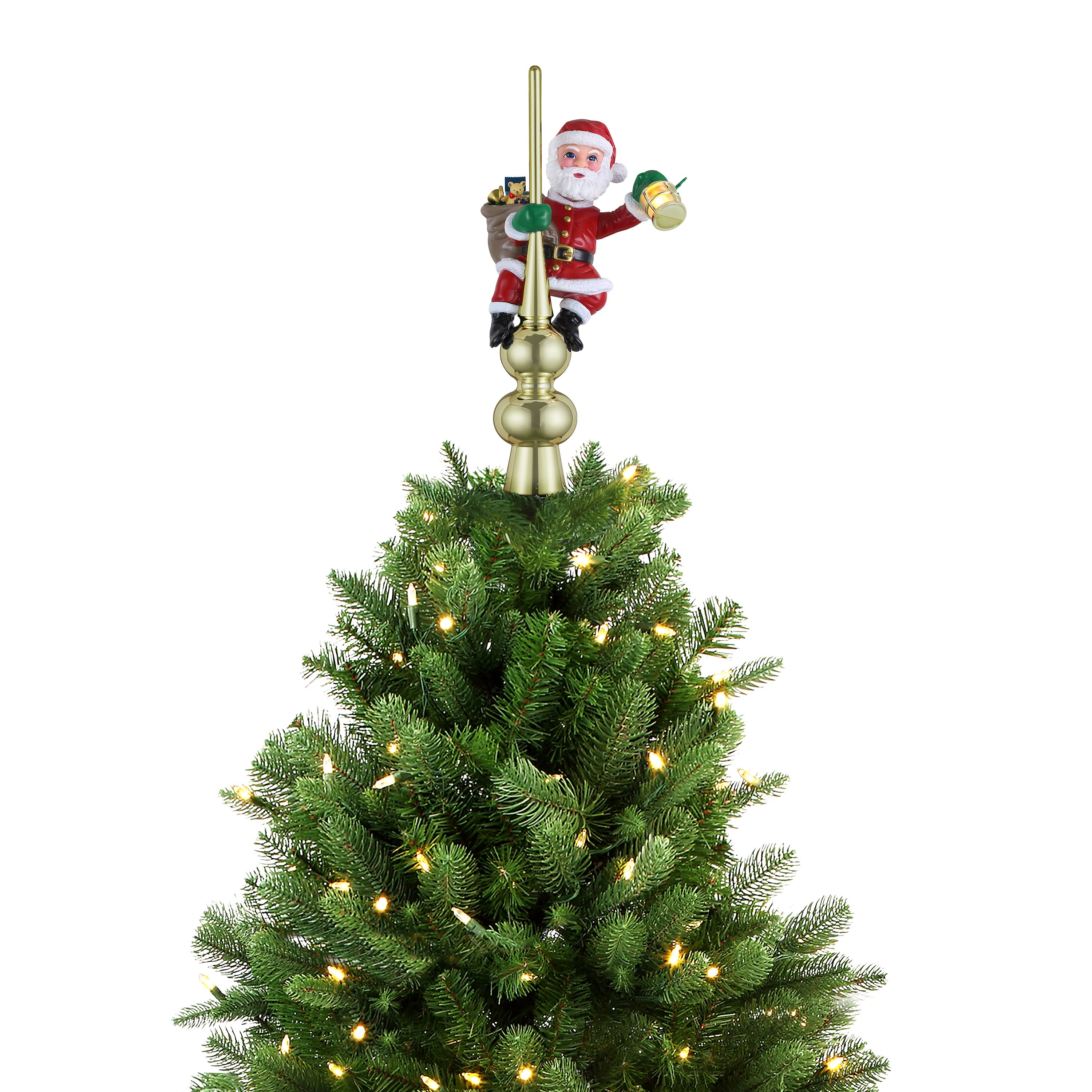A gold finial Christmas tree topper featuring a Santa Claus figurine holding a sack and gift, mounted at the top of a green Christmas tree with warm white lights, isolated on a white background.