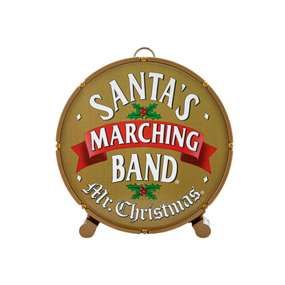 Close-up of bass drum from Mr. Christmas Animated Santa's Marching Band with song selection button
