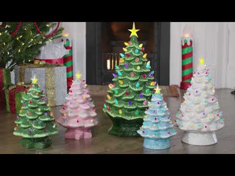 Load video: Video featuring a variety of nostalgic Mr. Christmas ceramic trees, including the 12-inch light blue version with LED lights