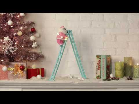 Load video: 17&quot; Animated Tabletop Pastel Climbing Black Santa Video