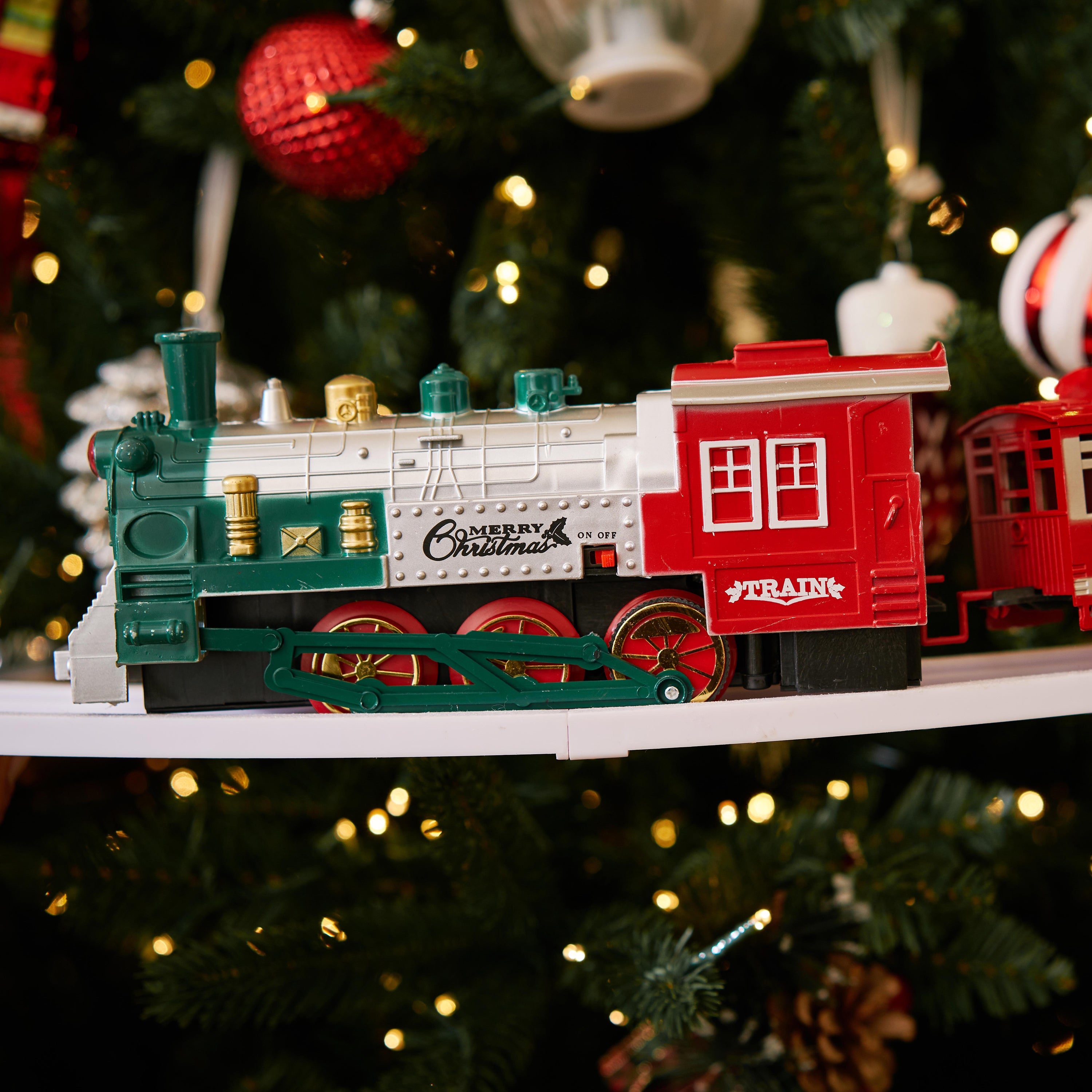 Train set around sales tree