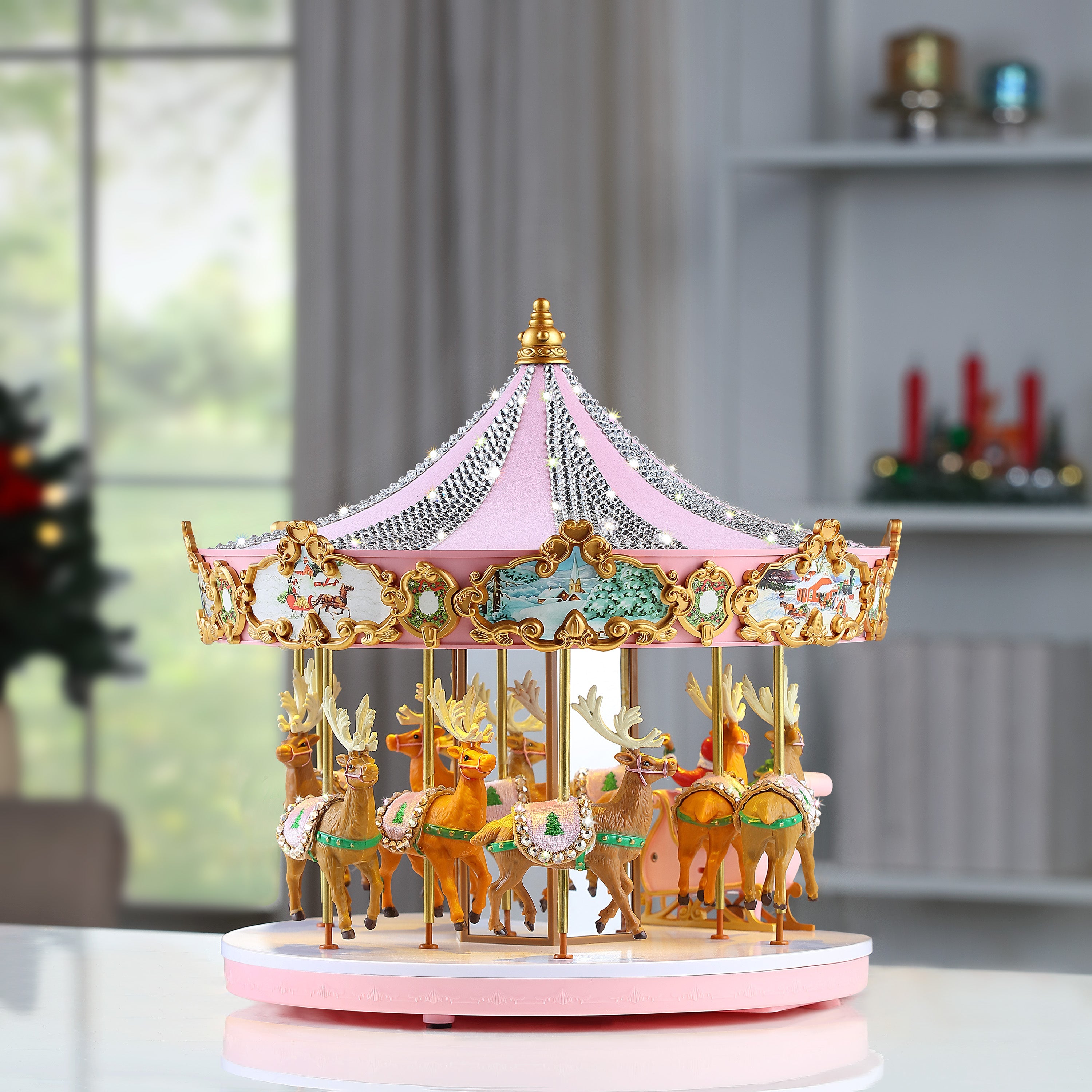 Mr. Christmas 12" Animated & Musical Pink Crystal Carousel displayed from alternate tabletop angle with festive décor