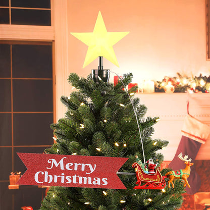 Mr. Christmas Animated Sleigh Tree Topper with Banner – Black Santa, shown near a fireplace and window in a holiday setting.