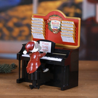 Alternate lifestyle image of Mr. Christmas Magical Maestro Mouse in a holiday setting.