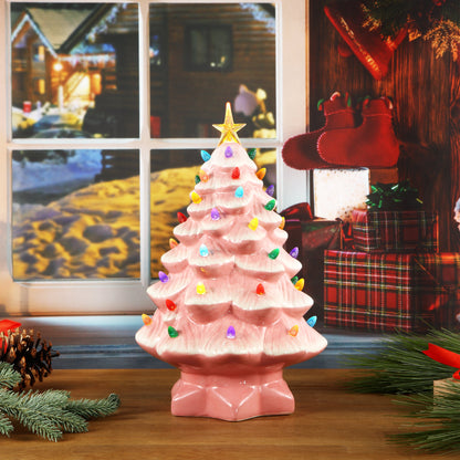 Mr. Christmas 14" Pink Nostalgic Christmas Tree by a window with holiday presents and cozy seasonal décor