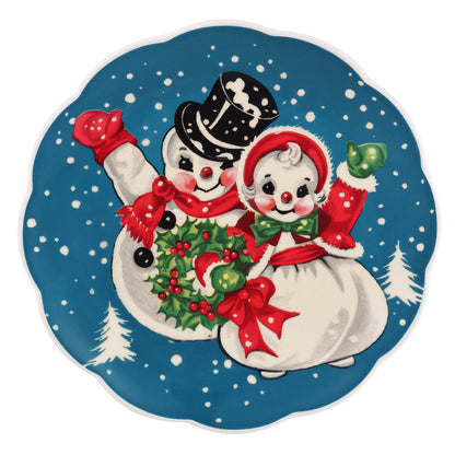 Blue snowman nostalgic scalloped plate by Mr. Christmas featuring snowman couple waving in snowy scene