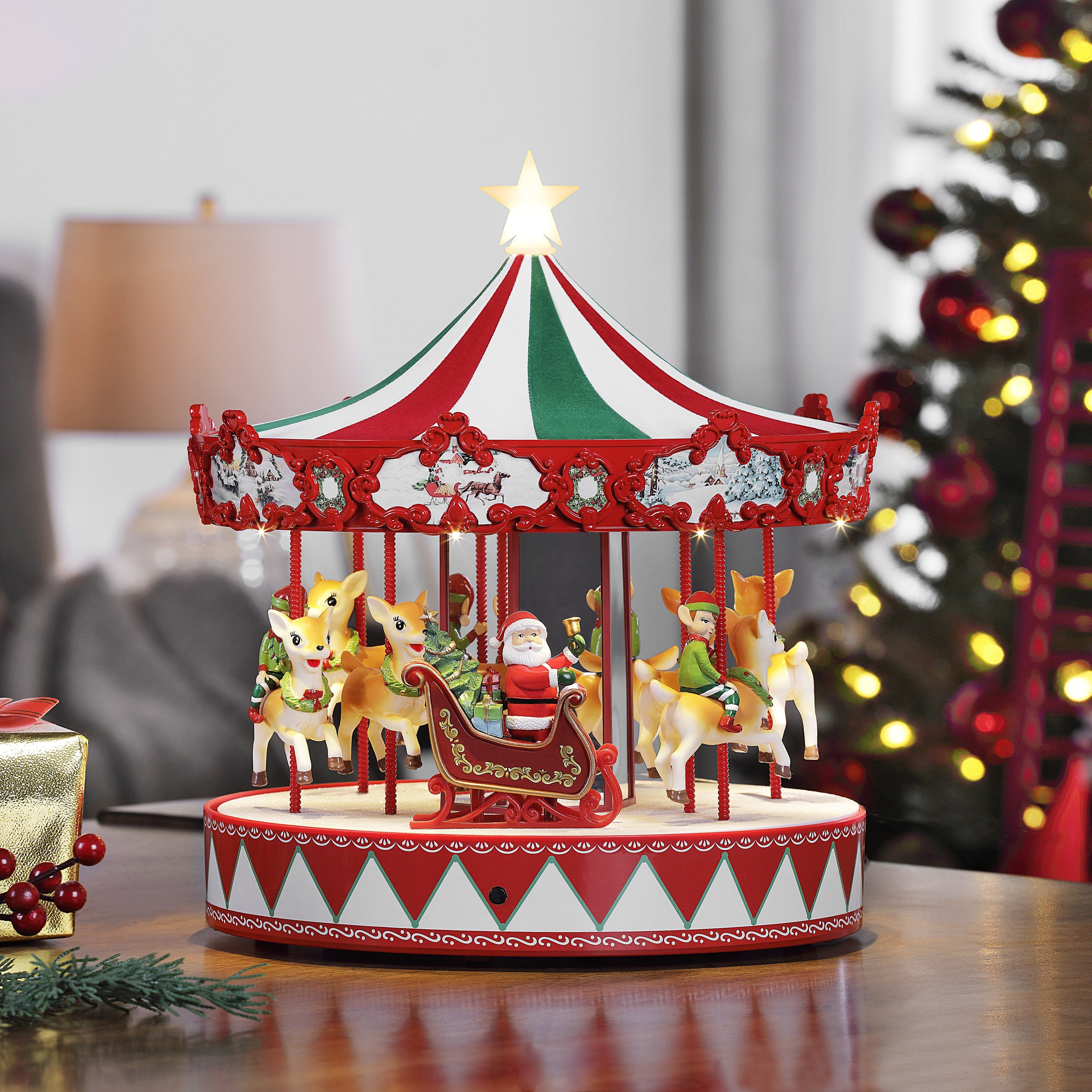 Mr. Christmas 14" Animated Vintage Carousel displayed on a festive tabletop setting